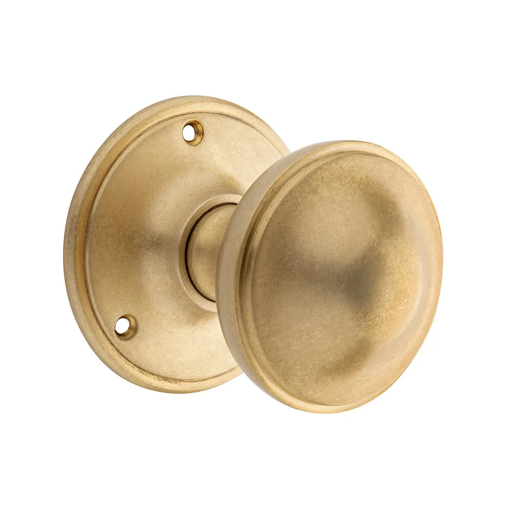 Draaibare deurknop 80mm in messing getrommeld